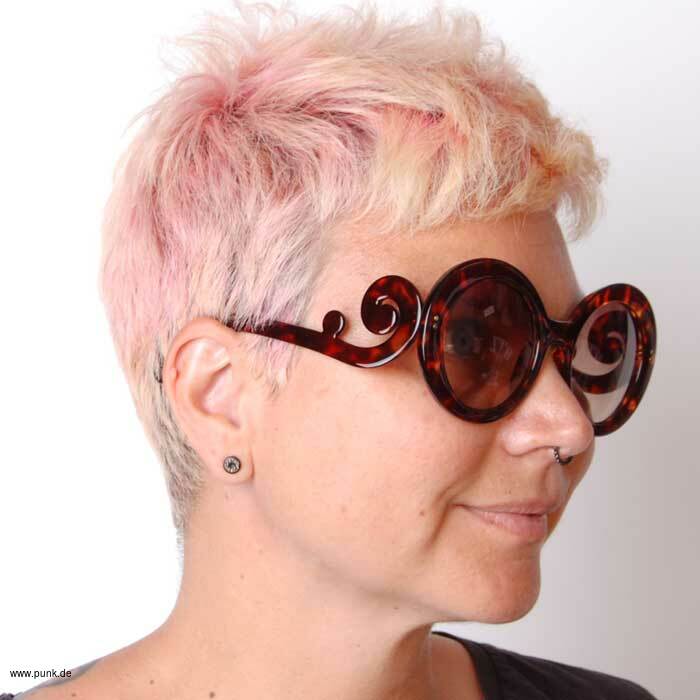 : Riesige runde Leopardenbrille mit verschnörkeltem Rahmen